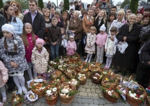 Ukrainian Orthodox worshipers gather outside a church before an Easter service.