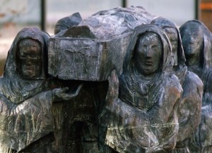 The modern statue of Cuthbert’s body being carried by monks outside Durham cathedral