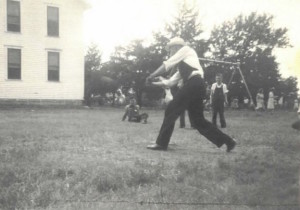 Fr. Emil Kapaun teaches baseball (Kansas, c. 1940)