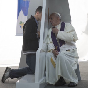 Pope Francis hears a confession at World Youth Day in Rio, 2013
