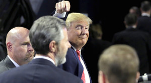 Trump points to Falwell Jr. (center): A sucker is born-again every minute.